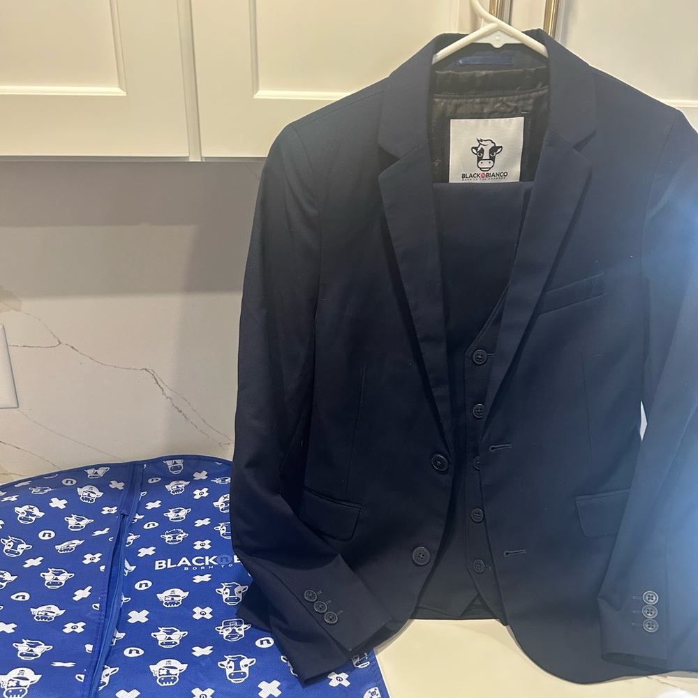 Like new Black n Bianco slim fitting boys navy suit.